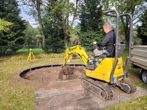 Trampoline Installation -Digger (3) Trampoline Ingraaf Service Flat to the ground